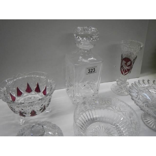 323 - A good lot of cut and other glass ware including decanter, COLLECT ONLY.