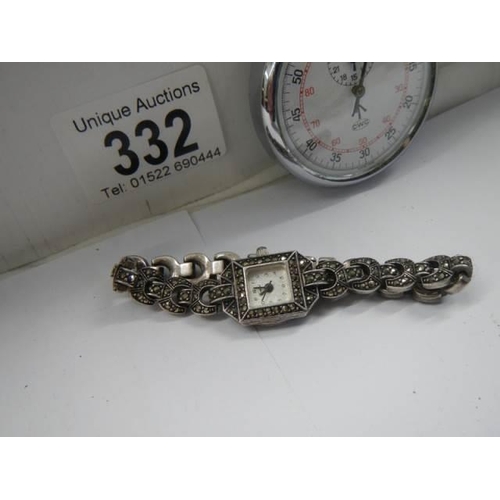 332 - A ladies marcasite wrist watch together with a good working stop watch.