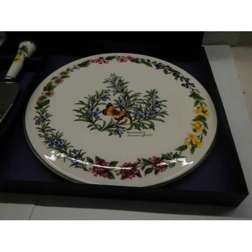 334 - A boxed Royal Worcester porcelain cake plate with cake slice.