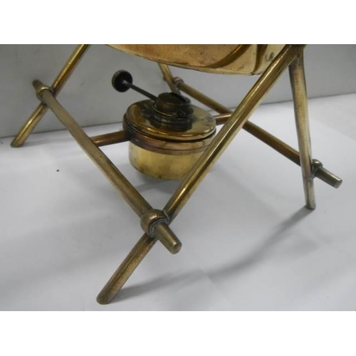 344 - An old brass spirit kettle on stand.