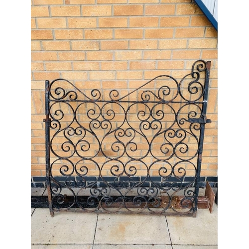 715 - A Pair of wrought Iron gates with posts.