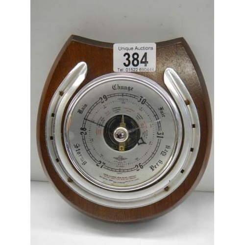 384 - A horse shoe shaped barometer.