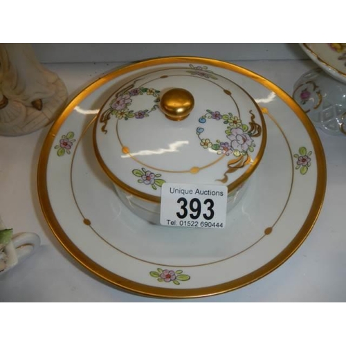 393 - Five items of porcelain including butter dish, posies etc.,