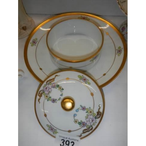 393 - Five items of porcelain including butter dish, posies etc.,