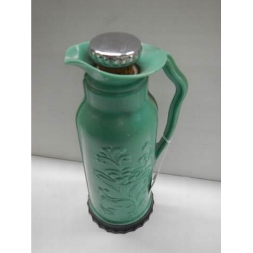 397 - A vintage green bakelite hot water flask by 'The British Vacuum Flask Co.,'