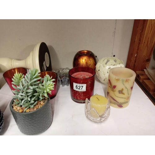 627 - A quantity of decorative items, plants & candles