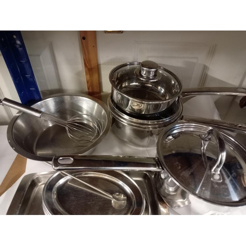 647 - A quantity of stainless pans etc