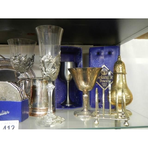 412 - A good lot of boxed and un-boxed silver plate.