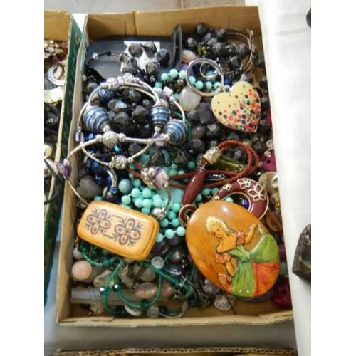 434 - Four good trays of costume jewellery.