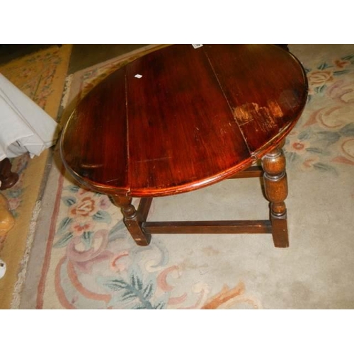 466 - An oak swivel top occasional table, COLLECT ONLY.