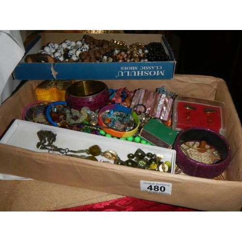 480 - Two trays of assorted costume jewellery.