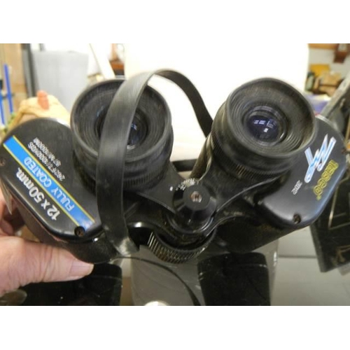 487 - A pair of Tasco 12 x 50mm binoculars.