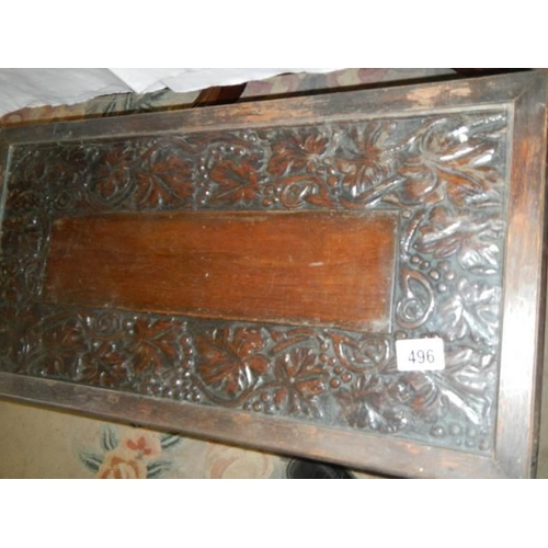 496 - A carved top coffee table with glass top, COLLECT ONLY.