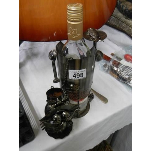 498 - A novelty bottle holder.