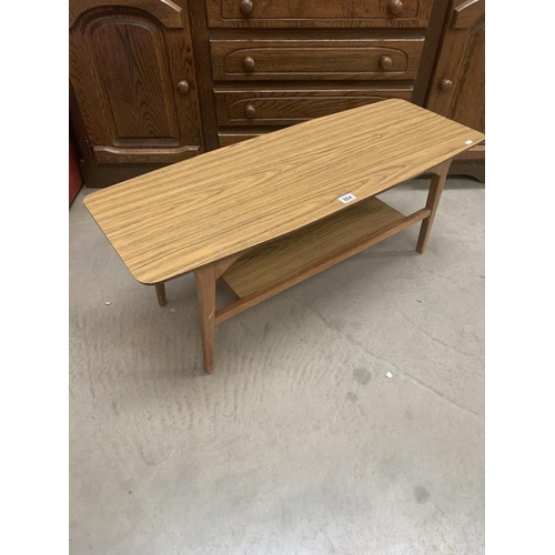 864 - Small coffee table with shelf