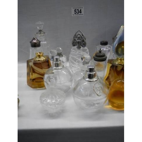 534 - A mixed lot of perfume bottles etc.,