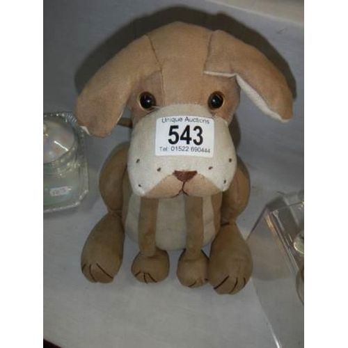 543 - A fabric dog doorstop.