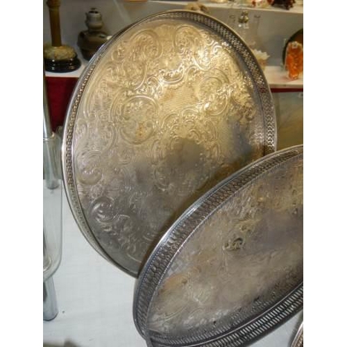 573 - Three silver plate trays.