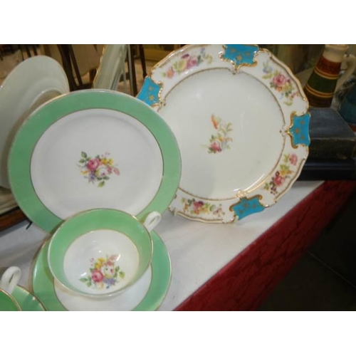 587 - Two hand painted trio's and two hand painted plates.