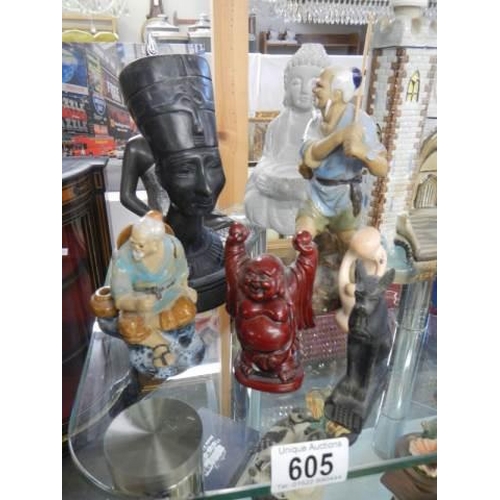 605 - A collection of oriental and Egyptian figures.