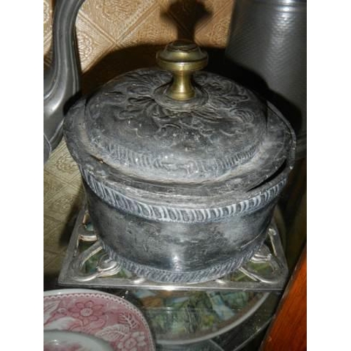 625 - Two pewter teapots and other metal ware.