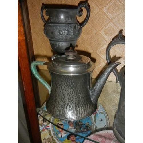 625 - Two pewter teapots and other metal ware.