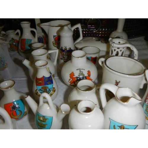 637 - A mixed lot of crested china.