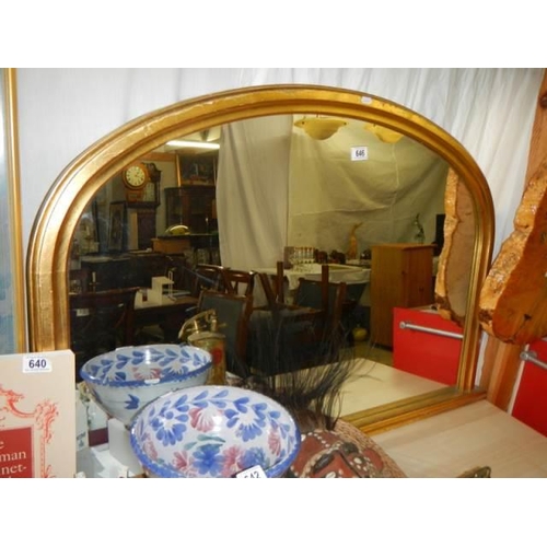 646 - A gilt framed overmantel mirror. COLLECT ONLY