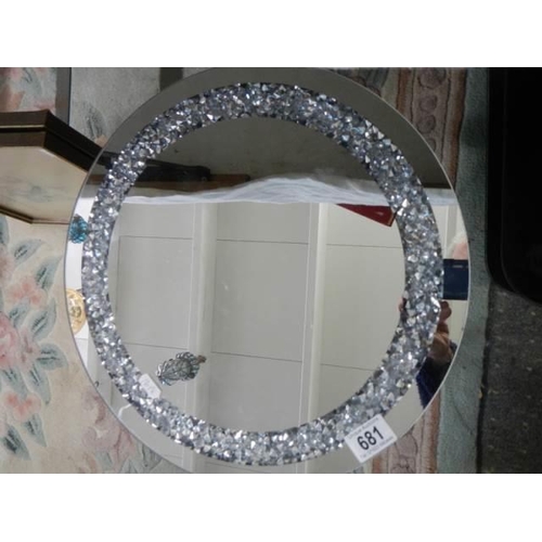 681 - A circular glass topped coffee table, COLLECT ONLY.