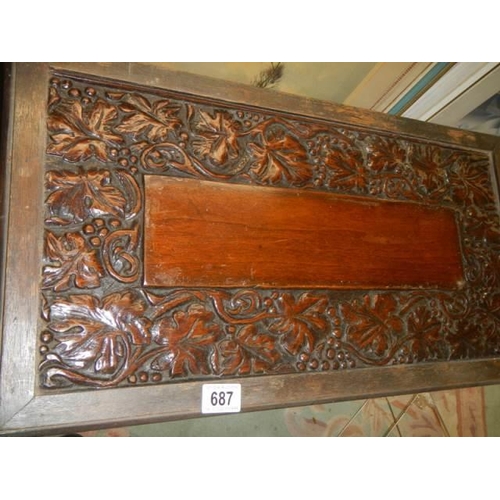 687 - A carved top coffee table, COLLECT ONLY