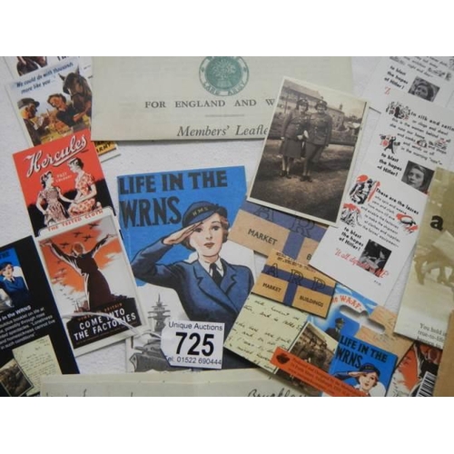 725 - A mixed lot of WRNS and Land Girls memorabilia.