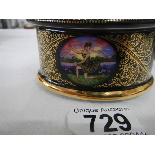 729 - A Russian porcelain music box featuring a scene from Swan Lake.