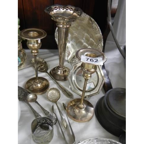 762 - A mixed lot of silver plate including candlesticks.