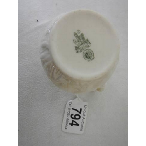 794 - A Belleek cream jug.