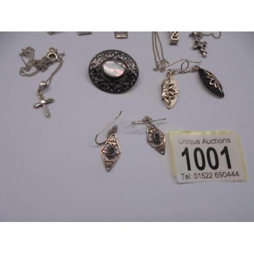 1001 - A mixed lot of silver jewellery including pendants, earrings, bracelet etc., approximately 66 grams.