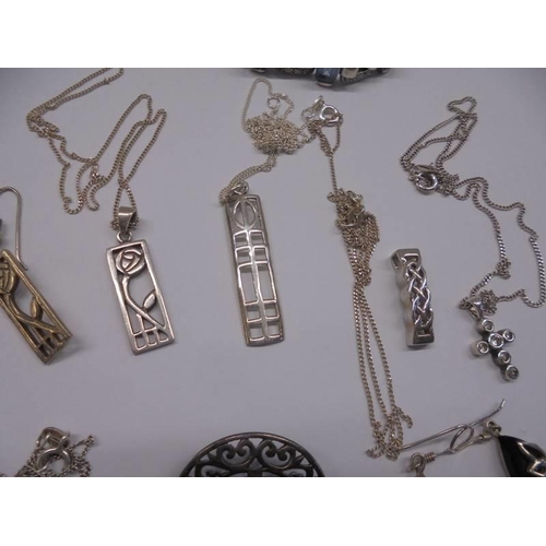 1001 - A mixed lot of silver jewellery including pendants, earrings, bracelet etc., approximately 66 grams.