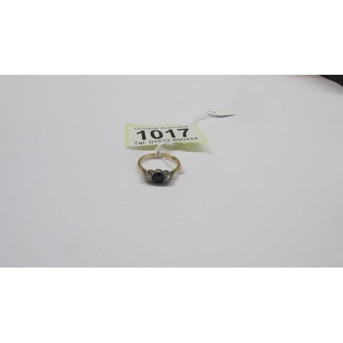 1017 - An 18ct gold diamond and sapphire ring, size K half,  2.4 grams.