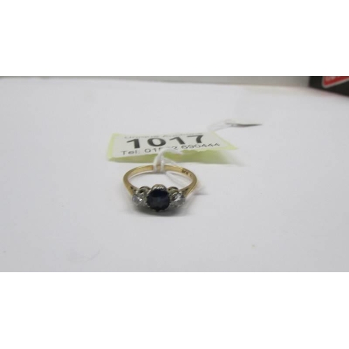 1017 - An 18ct gold diamond and sapphire ring, size K half,  2.4 grams.