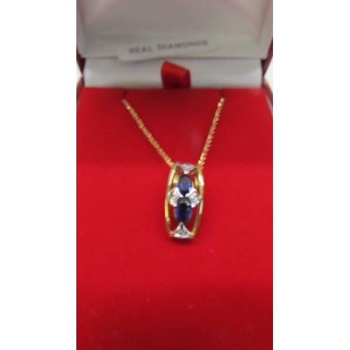 1019 - A superb quality 9ct gold diamond and sapphire pendant with attached 9ct gold chain, 2.3 grams.