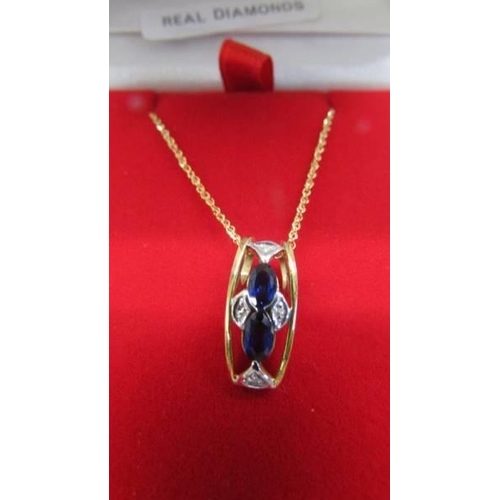 1019 - A superb quality 9ct gold diamond and sapphire pendant with attached 9ct gold chain, 2.3 grams.