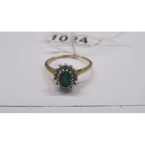 1024 - An 18ct yellow gold diamond and emerald ring, size S, 2.2 grams.