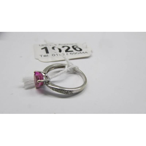 1026 - A white gold pink sapphire and diamond ring, size L, 1.8 grams.