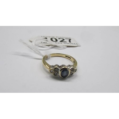 1027 - A yellow gold oval sapphire and diamond ring, size L, 2.3 grams.