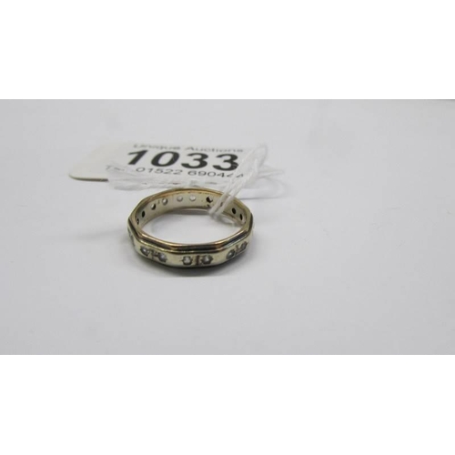 1033 - A gold eternity ring, 2.8 grams.