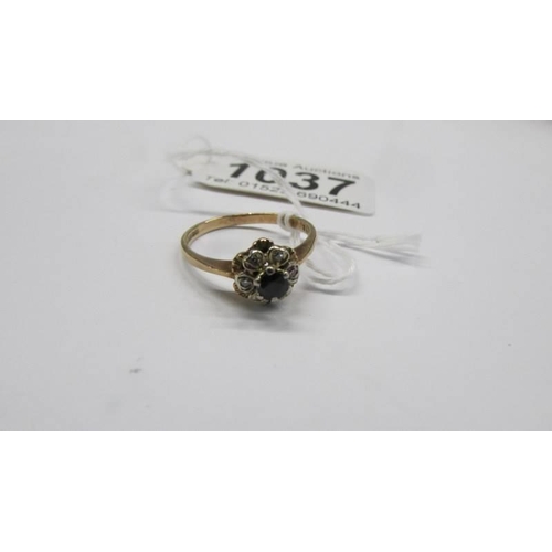 1037 - A yellow gold sapphire and diamond ring, size O, 2.3 grams.