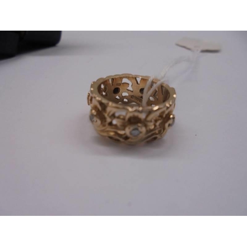 1052 - A 9ct gold ring, size H, 5.4 grams, (fitted with size reducer which could be removed).