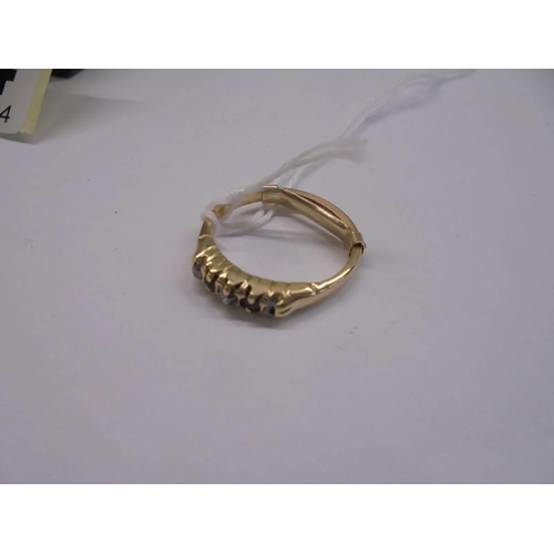 1054 - A 9ct gold ring, size F , 2.2 grams.