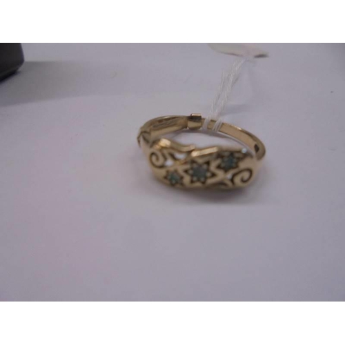 1055 - A 9ct gold ring, size H, 1.9 grams, (fitted with size reducer which could be removed).