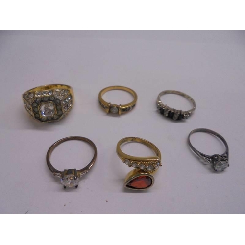 1059 - Six assorted dress rings.