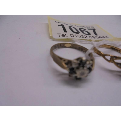 1067 - Two 9ct gold rings size K and K half (one missing a stone). 3.7 grams.